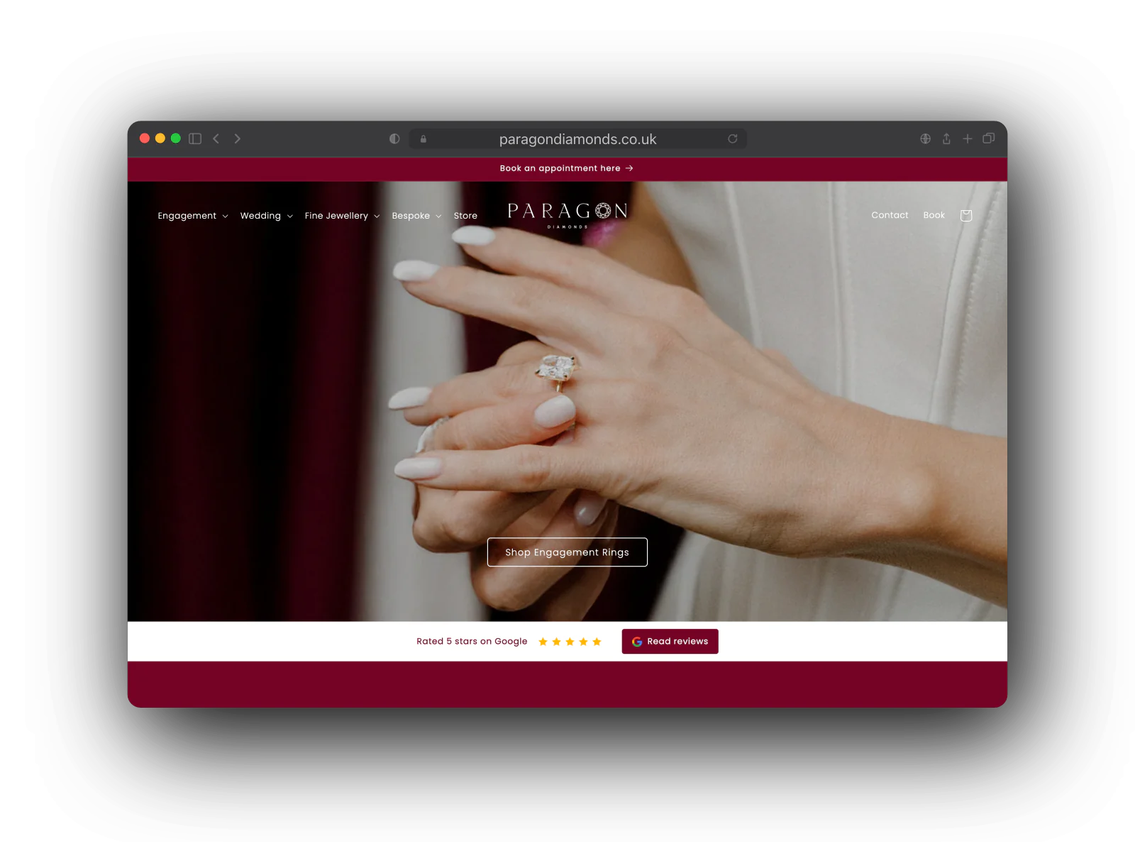 The Paragon Diamonds home page: a hand wearing a diamond engagement ring, the Paragon logo and menu, a Shop Engagement Rings button and a five star Google rating strip.